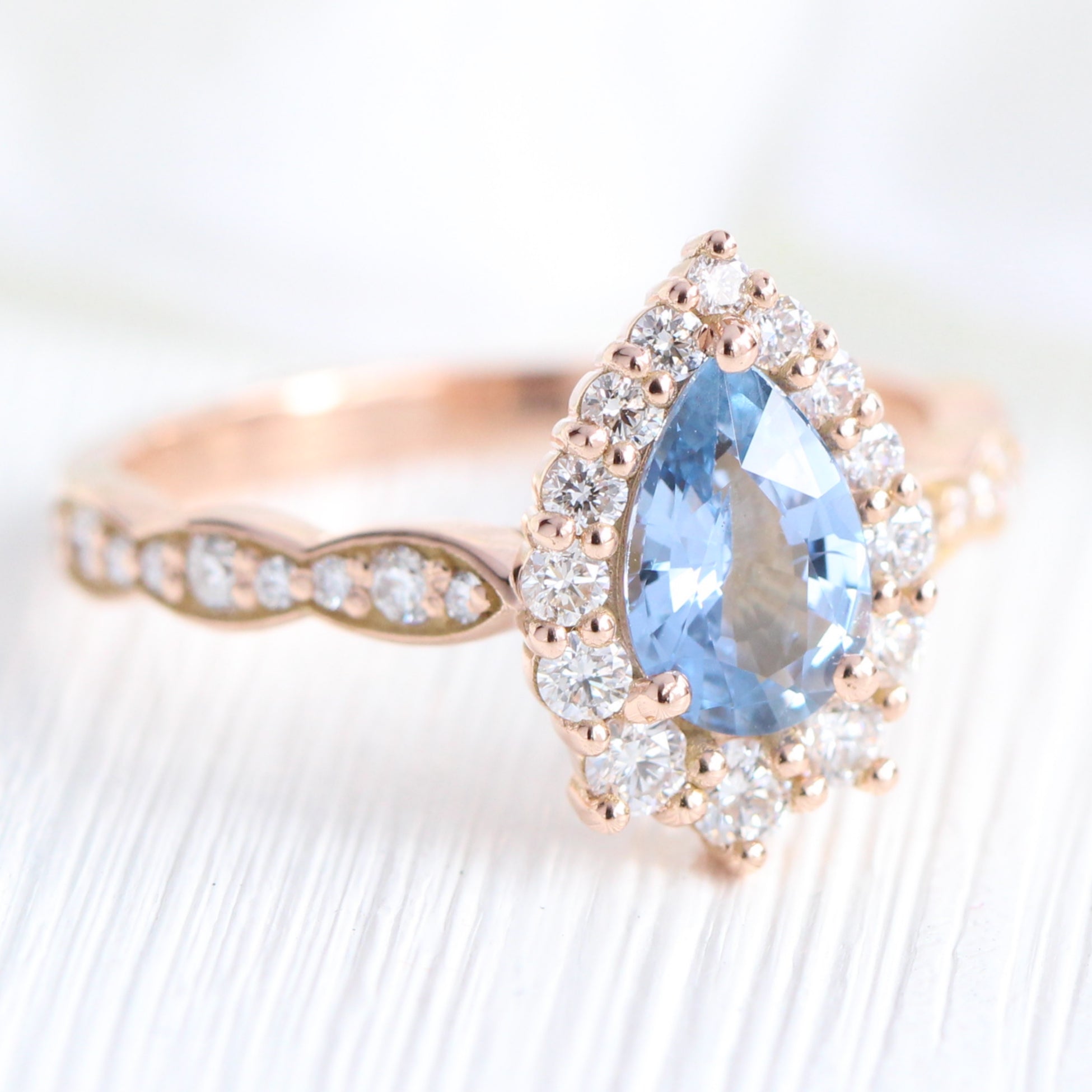 aqua blue sapphire ring rose gold halo diamond pear engagement ring la more design jewelry