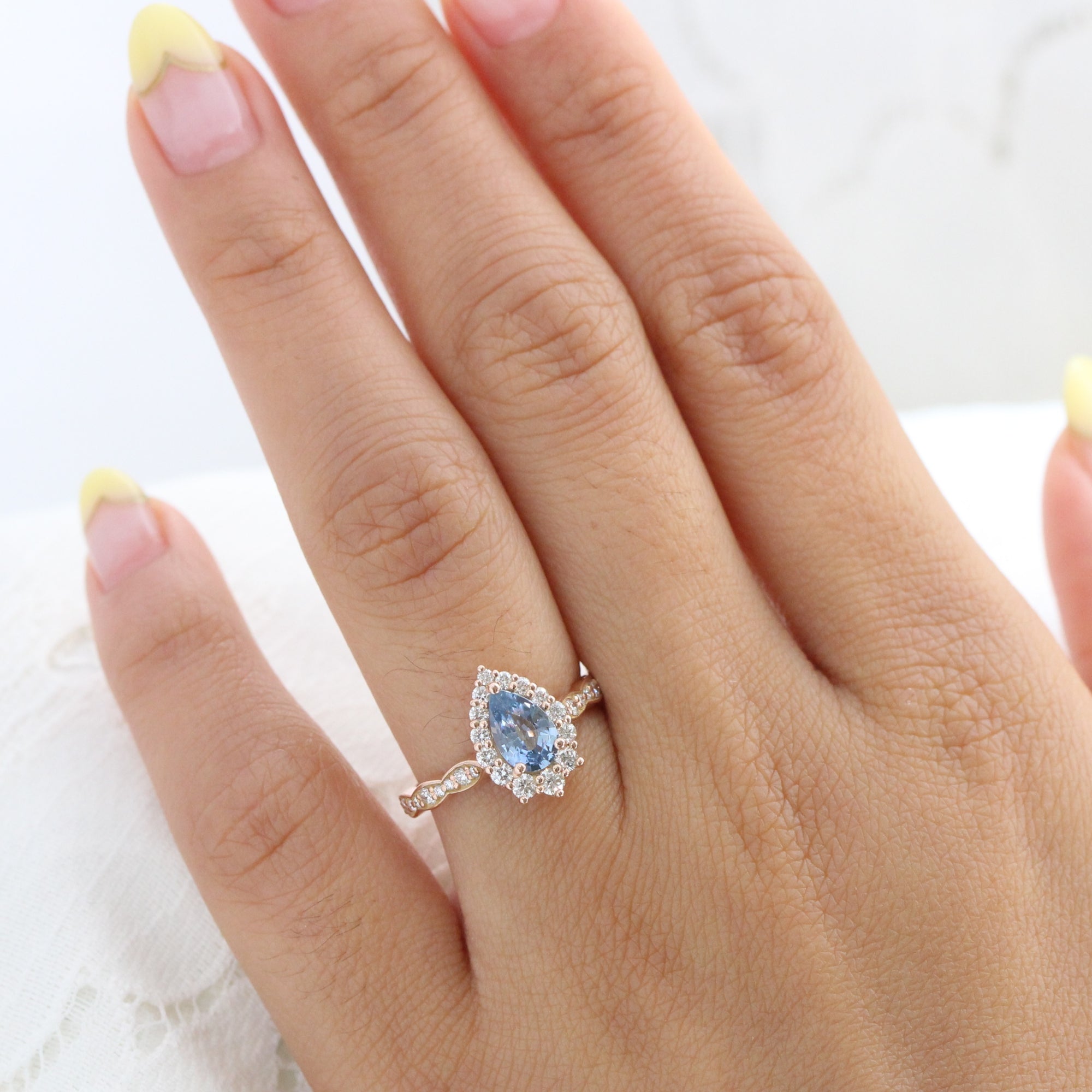 aqua blue sapphire ring rose gold halo diamond pear engagement ring la more design jewelry