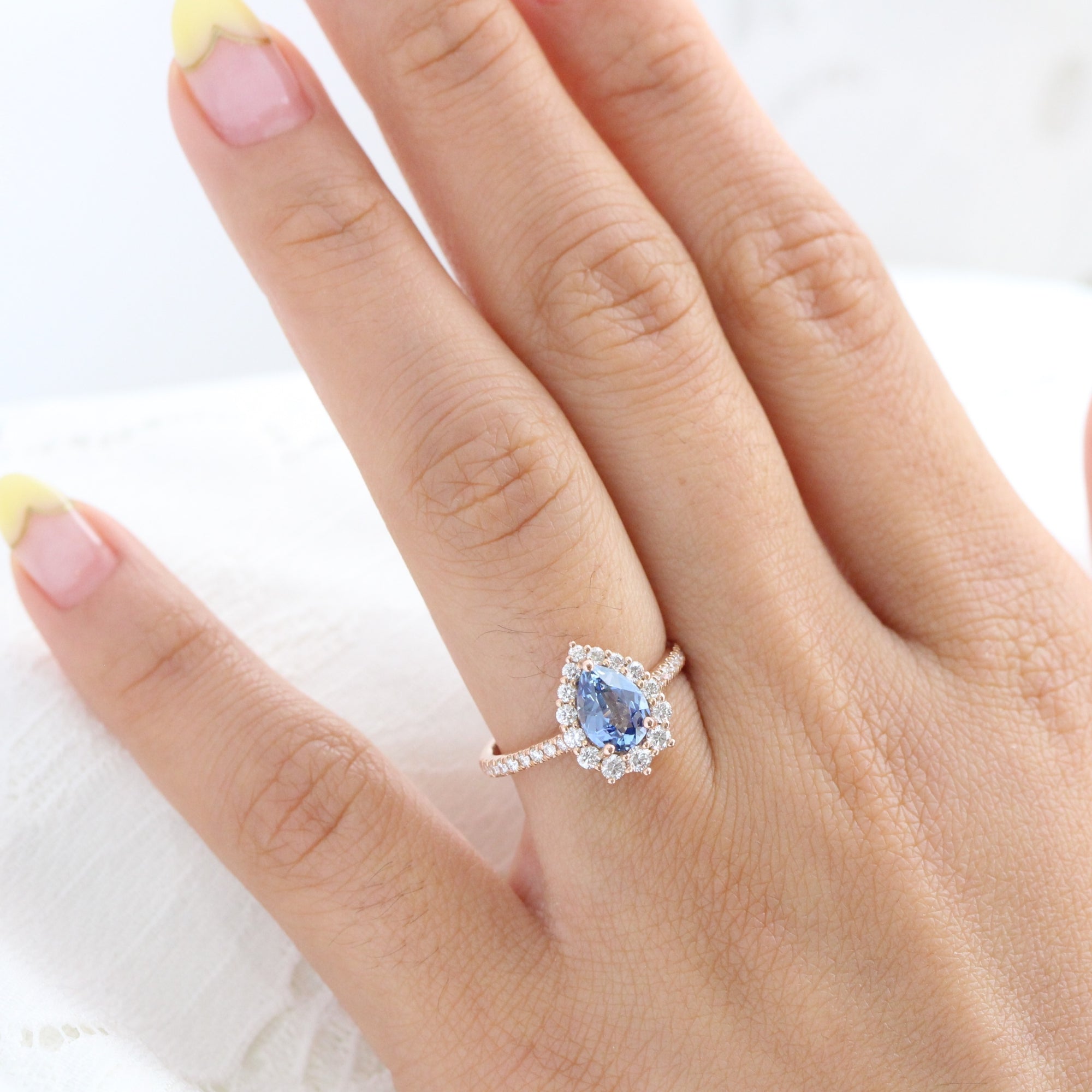 aqua blue sapphire ring rose gold halo diamond pear engagement ring la more design jewelry