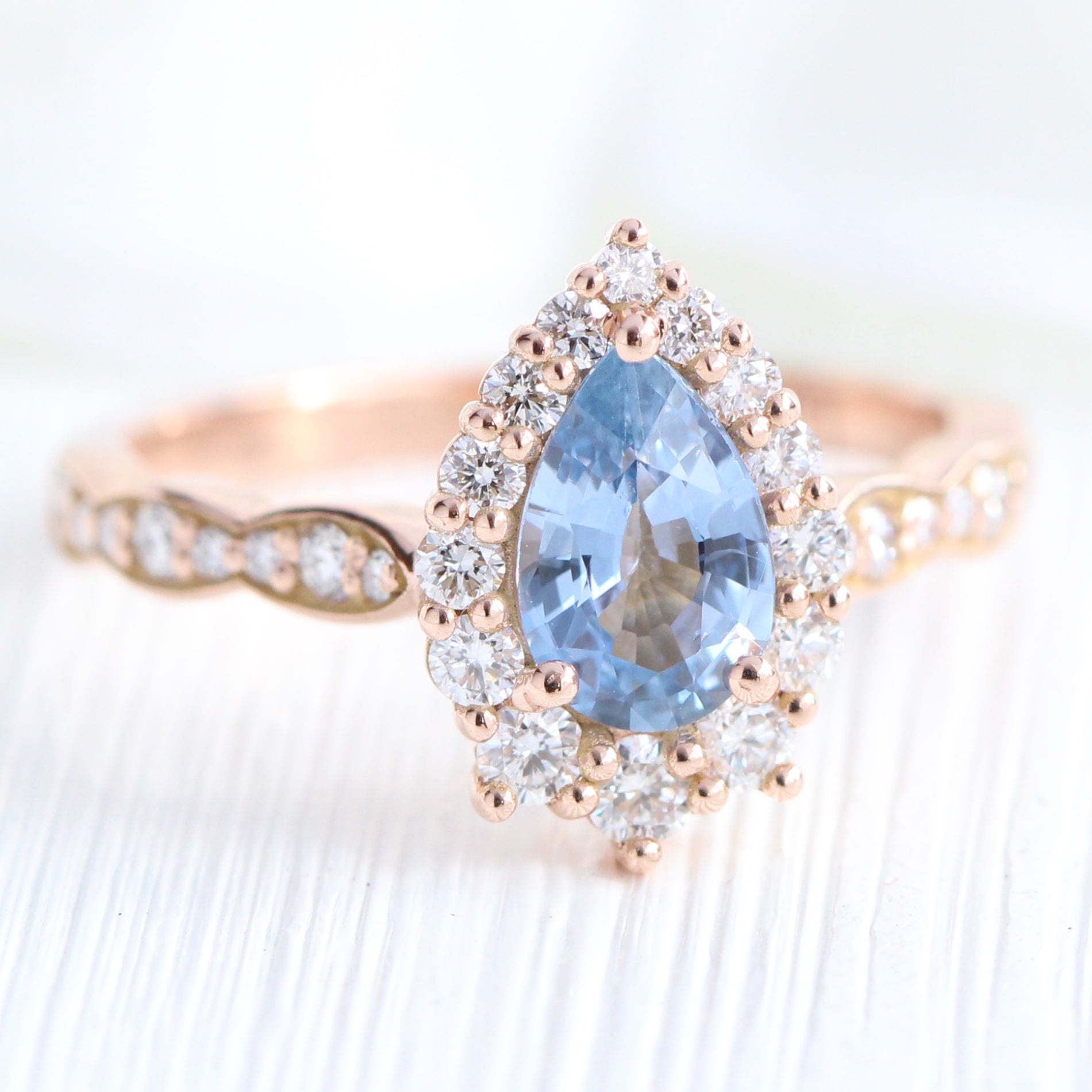 aqua blue sapphire ring rose gold halo diamond pear engagement ring la more design jewelry