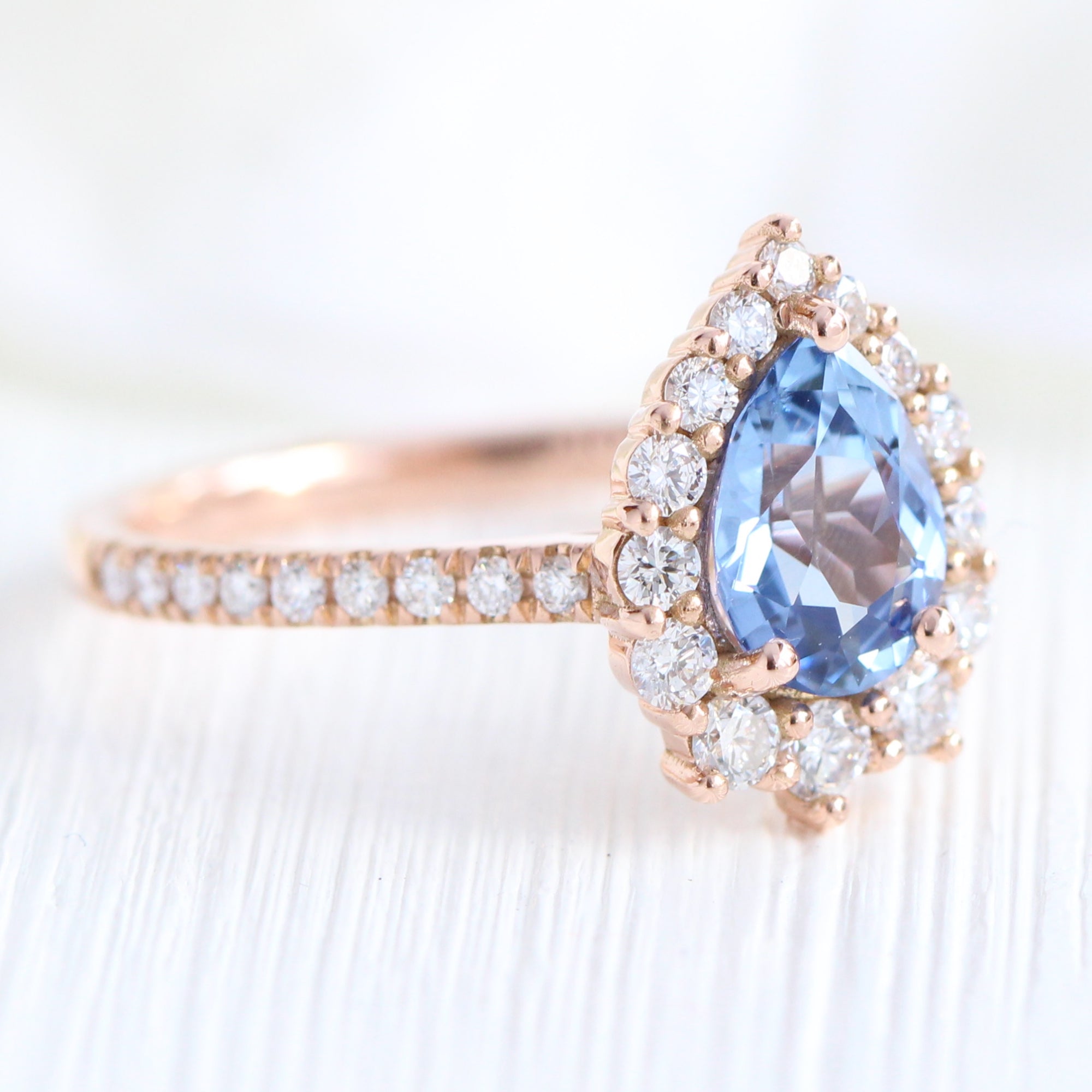 aqua blue sapphire ring rose gold halo diamond pear engagement ring la more design jewelry