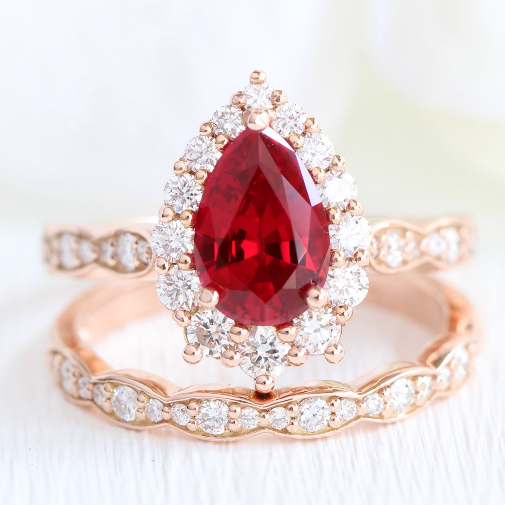 halo diamond large pear ruby ring stack rose gold eternity wedding band la more design jewelry