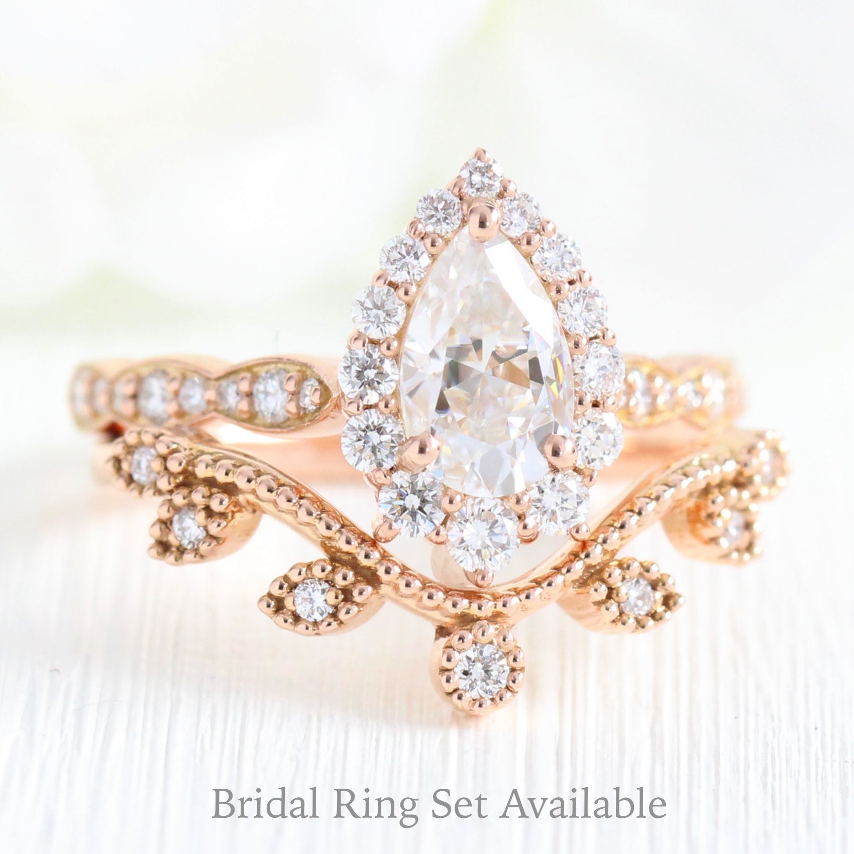 halo diamond pear moissanite engagement ring and curved wedding band la more design jewelry