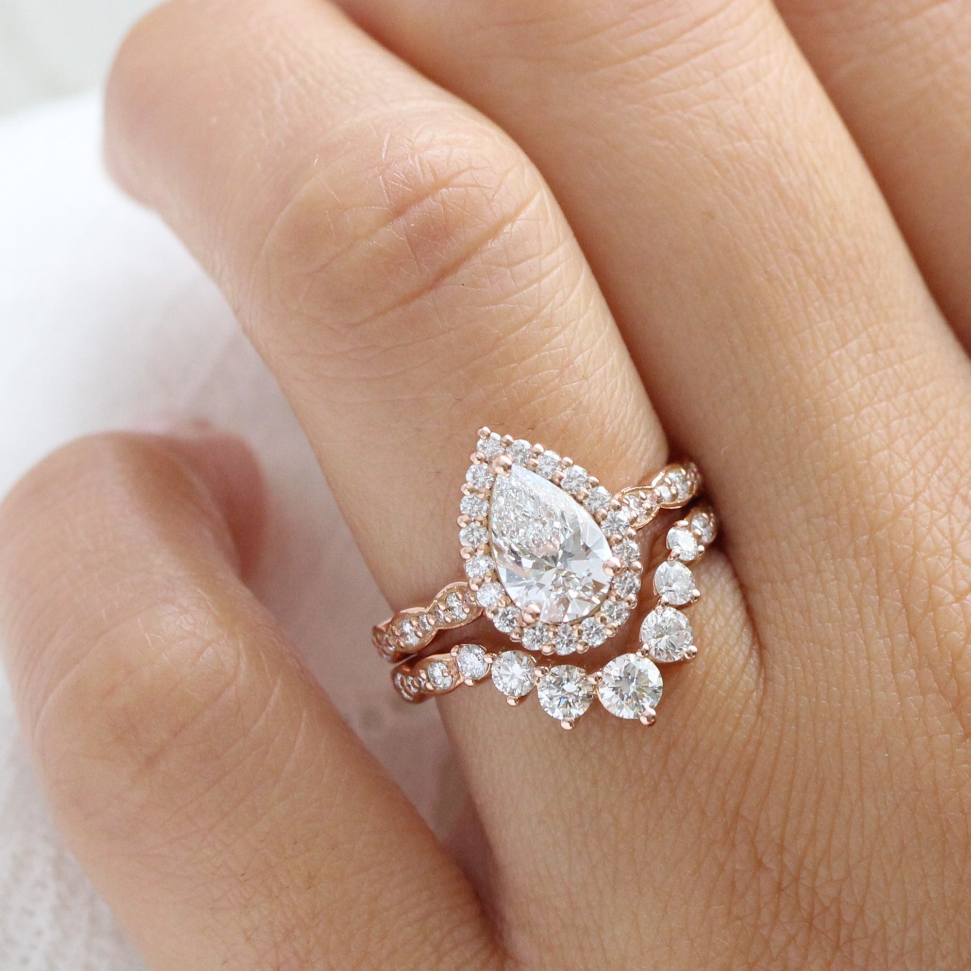 Halo pear store shaped ring