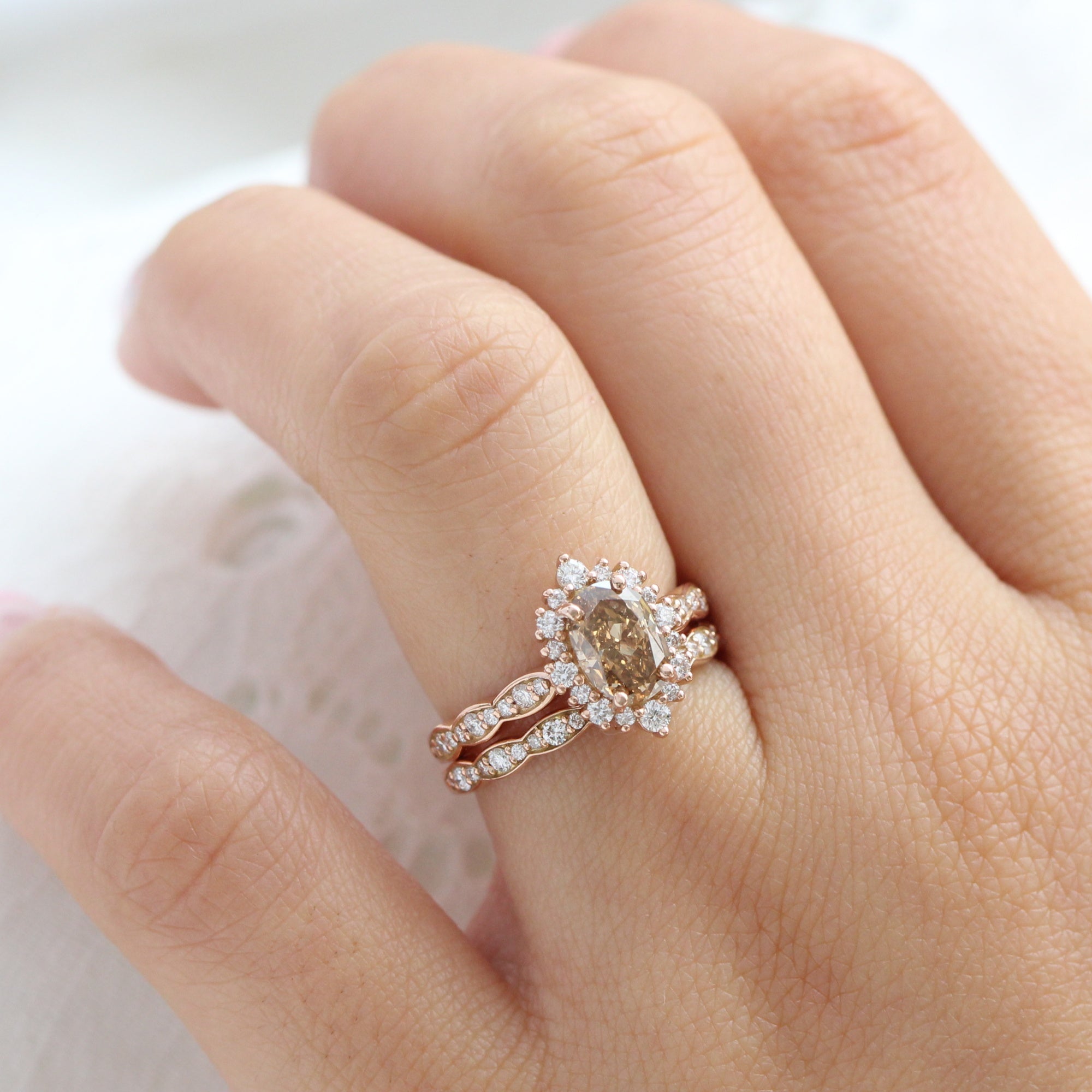 Oval champagne diamond engagement on sale ring