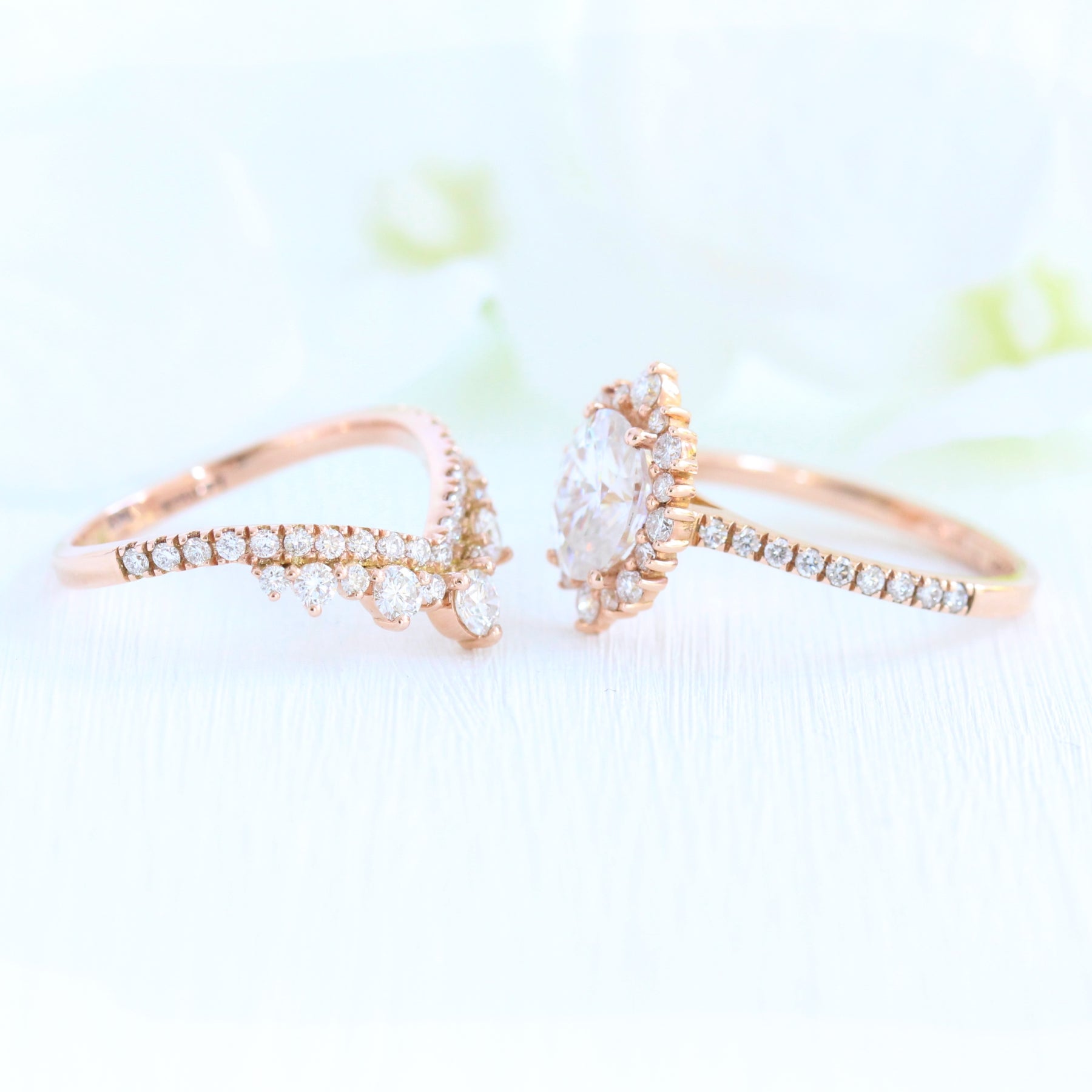 oval moissanite engagement ring rose gold halo diamond bridal set and contour diamond wedding band by la more design jewelry