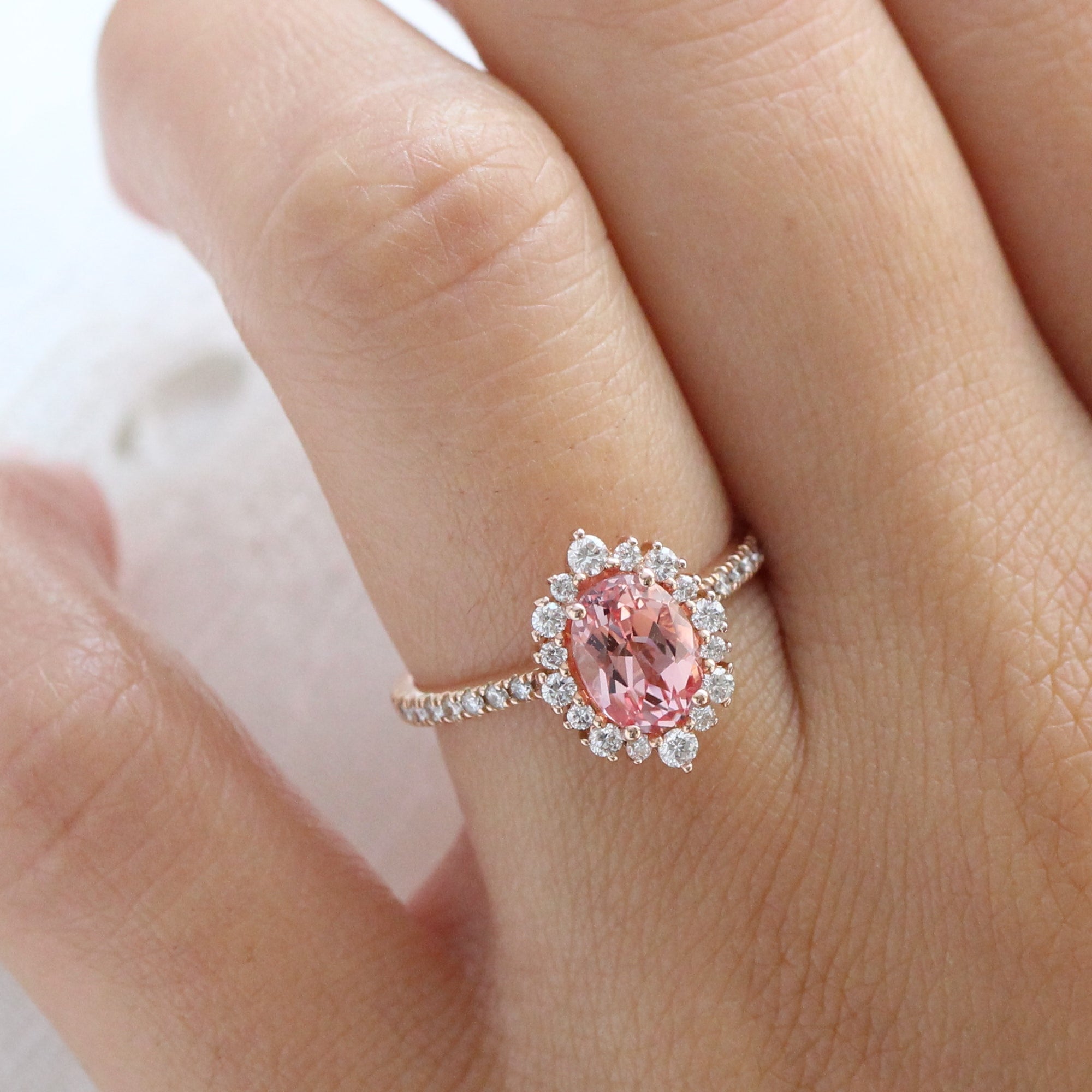 oval peach sapphire engagement ring rose gold halo diamond ring low profile ring by la more design jewelry