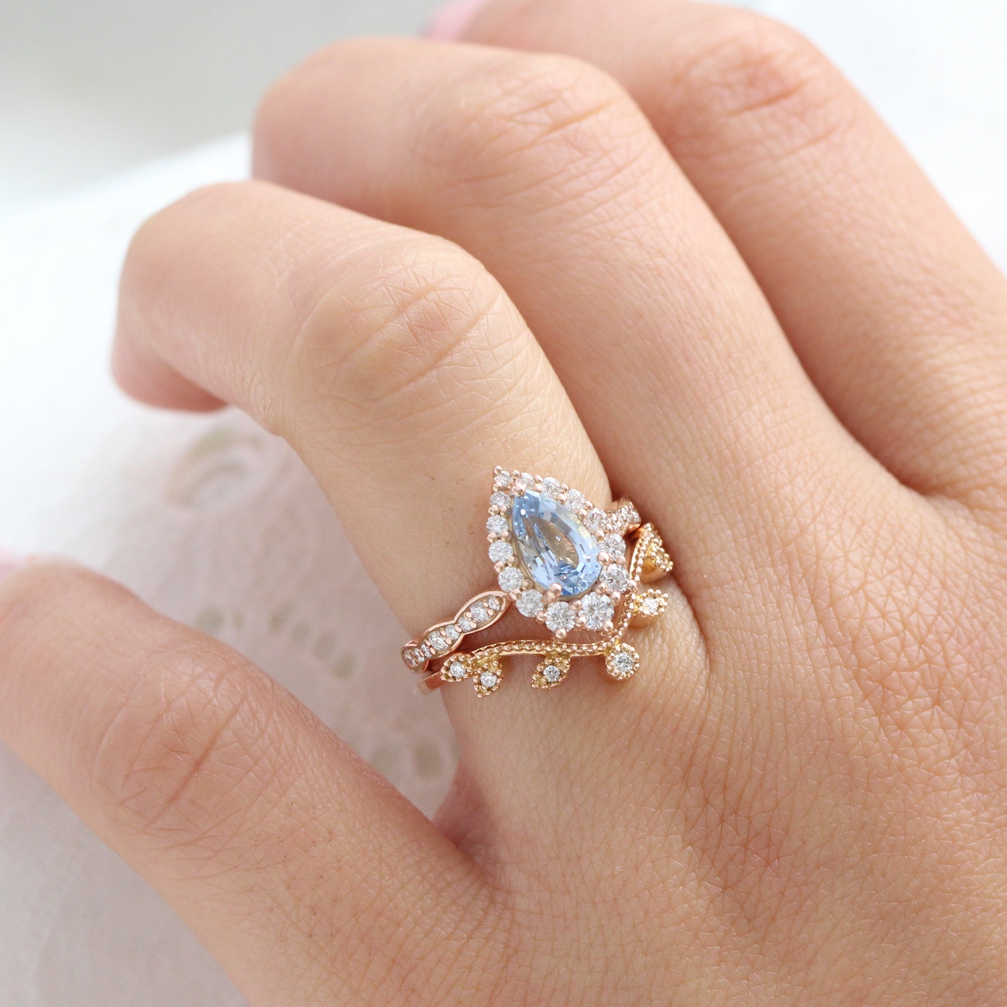 pear aqua blue sapphire ring rose gold halo diamond ring scalloped diamond band la more design jewelry