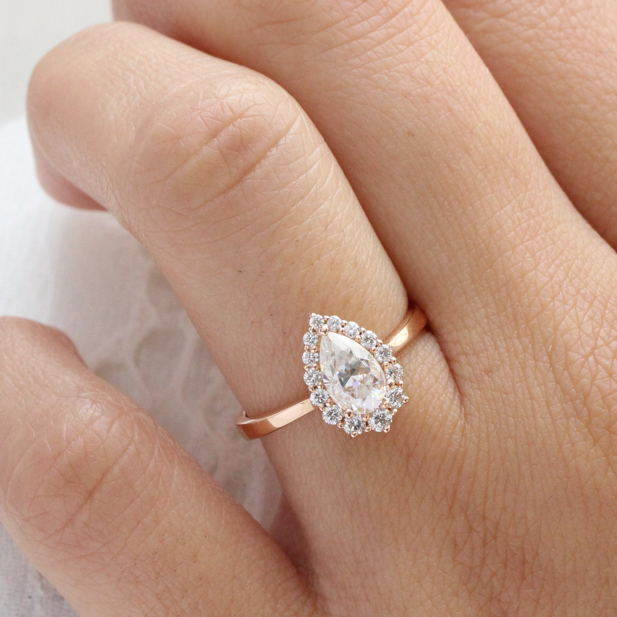 pear moissanite engagement ring rose gold halo diamond ring low profile ring by la more design jewelry