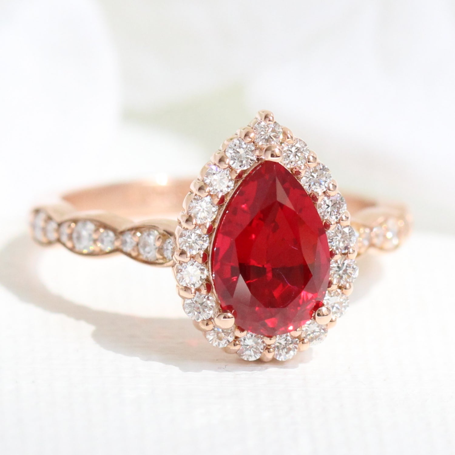 pear ruby engagement ring rose gold halo diamond ring by la more design jewelry