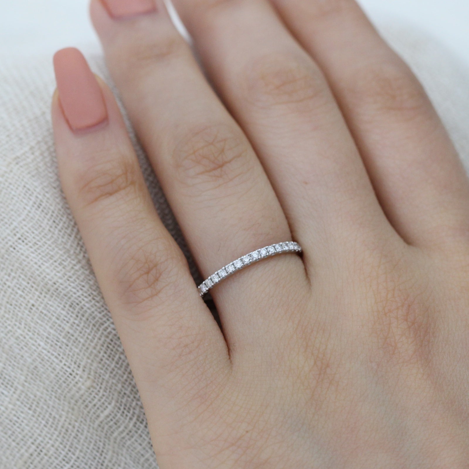 petite white gold wedding ring half eternity diamond band by la more design