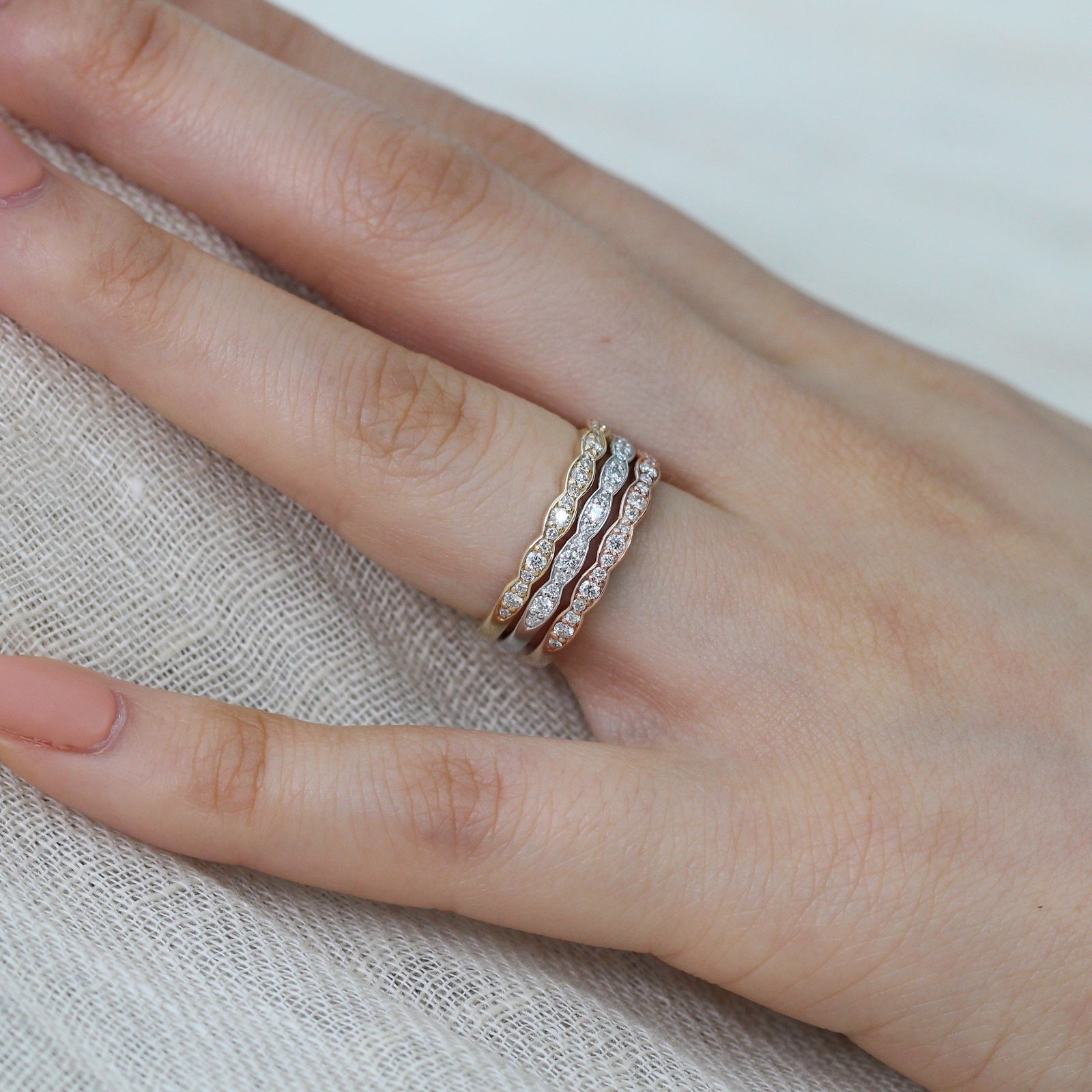 Diamond wedding ring in scalloped half eternity band by la more design