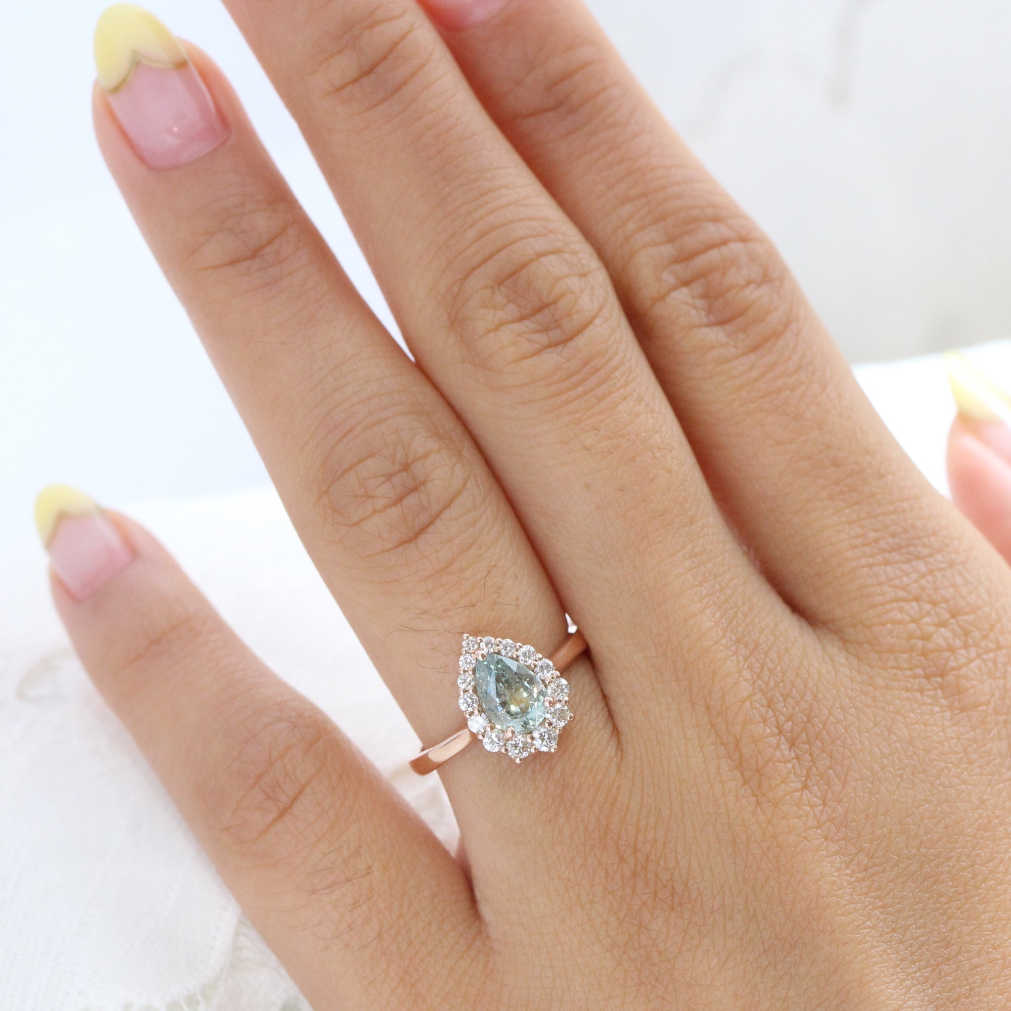 seafoam green sapphire ring rose gold halo diamond pear engagement ring la more design jewelry