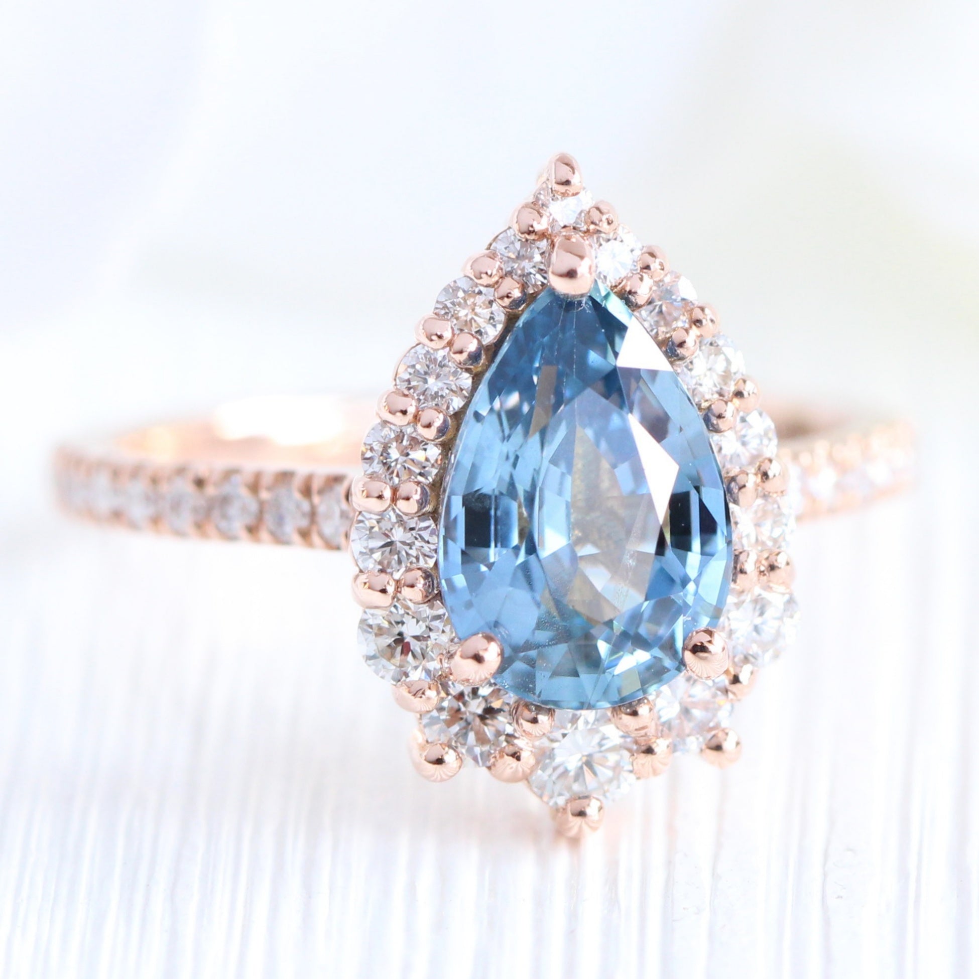 teal blue sapphire ring rose gold halo diamond pear engagement ring la more design jewelry