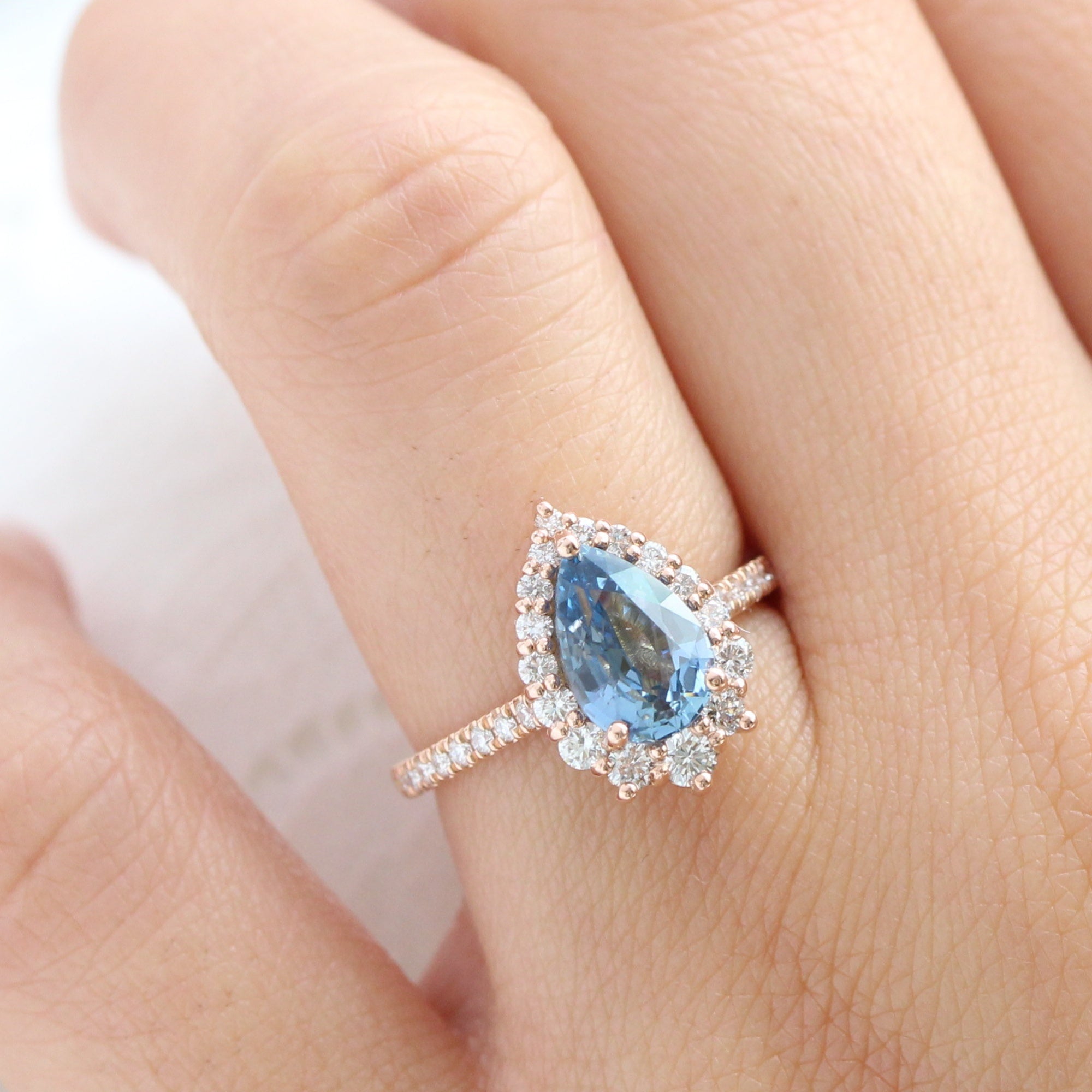 teal blue sapphire ring rose gold halo diamond pear engagement ring la more design jewelry